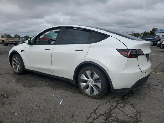Photo 2 from auction – 2021 TESLA MODEL Y with VIN 5YJYGAEE3MF144769