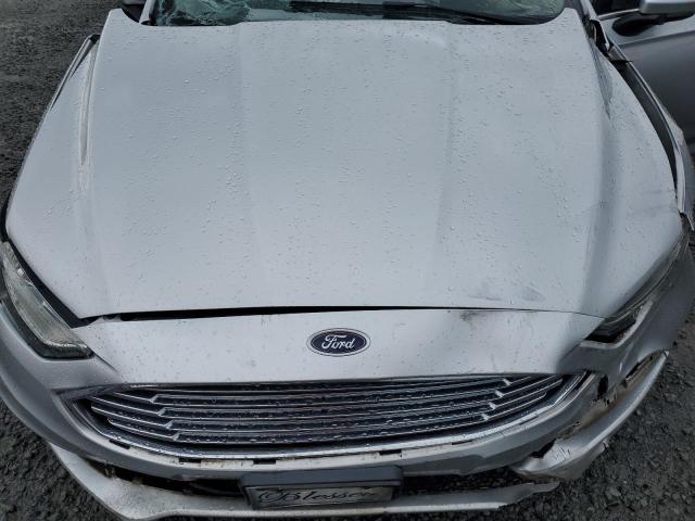 Photo 11 from auction – 2017 FORD FUSION S with VIN 3FA6P0G74HR339015