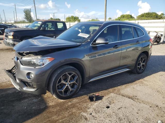 BMW X1 XDRIVE2 2018 with VIN WBXHT3C3XJ5L27434 - Photo from auction