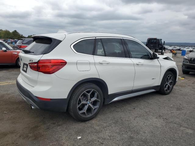 Photo 3 from auction – 2016 BMW X1 XDRIVE2 with VIN WBXHT3C34G5E55146