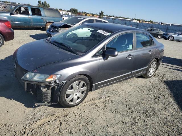 HONDA CIVIC LX 2010 with VIN 19XFA1F58AE080818 - Photo from auction