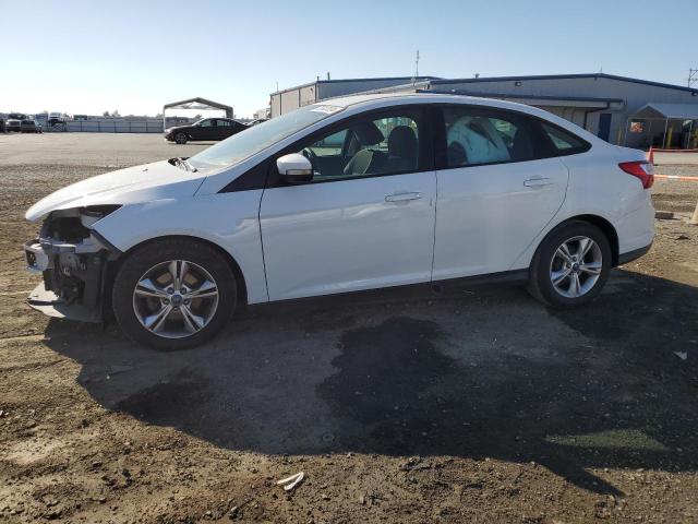 FORD FOCUS SE 2013 with VIN 1FADP3F24DL201014 - Photo from auction