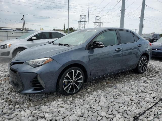 TOYOTA COROLLA L 2017 with VIN 5YFBURHE2HP593573 - Photo from auction
