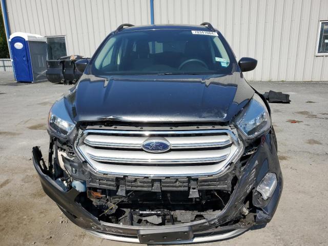 Photo 5 from auction – 2018 FORD ESCAPE SE with VIN 1FMCU9GD9JUD24942