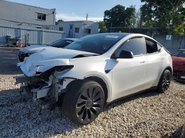 TESLA MODEL Y 2022 with VIN 7SAYGDEF3NF413612 - Photo from auction
