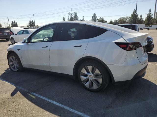 Photo 2 from auction – 2023 TESLA MODEL Y with VIN 7SAYGAEE6PF601422
