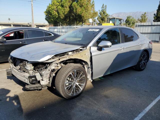 TOYOTA CAMRY L 2018 with VIN 4T1B11HK7JU123740 - Photo from auction