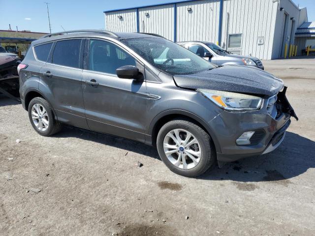 Photo 4 from auction – 2018 FORD ESCAPE SE with VIN 1FMCU0GD5JUA11429