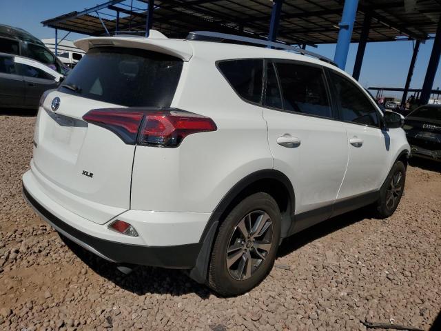 Photo 3 from auction – 2017 TOYOTA RAV4 XLE with VIN JTMWFREV1HJ128142
