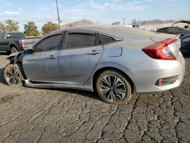 Photo 2 from auction – 2016 HONDA CIVIC EXL with VIN 2HGFC1F78GH658121