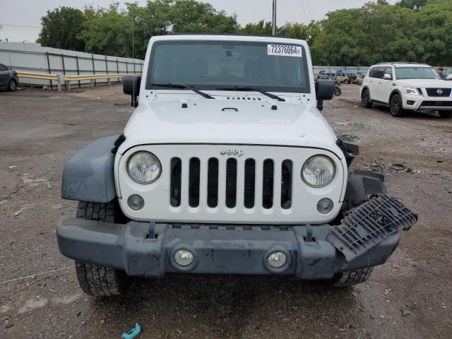 Photo 5 from auction – 2014 JEEP WRANGLER U with VIN 1C4BJWDG2EL250667
