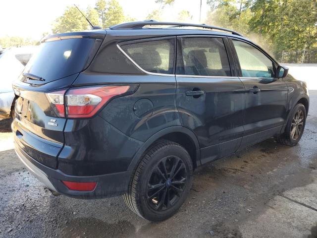 Photo 3 from auction – 2017 FORD ESCAPE SE with VIN 1FMCU9GDXHUD73187