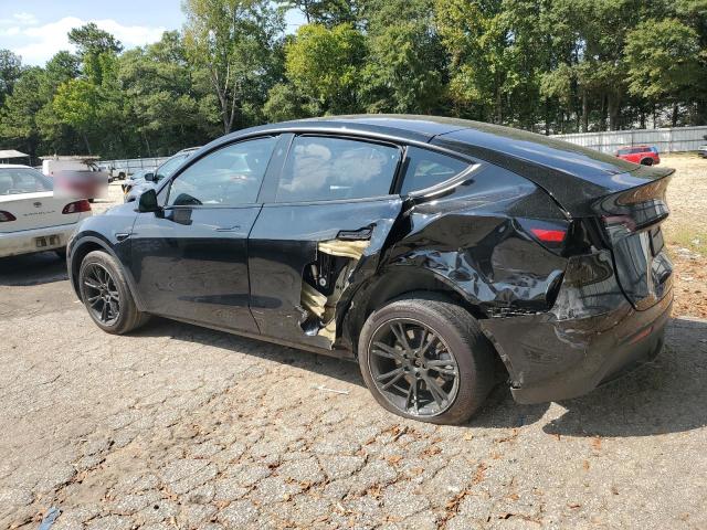 Photo 2 from auction – 2023 TESLA MODEL Y with VIN 7SAYGDEE2PF799661