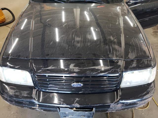 Photo 11 from auction – 2003 FORD CROWN VICT with VIN 2FAHP74W03X203908