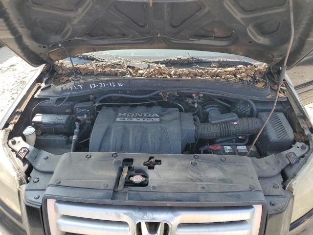Photo 12 from auction – 2007 HONDA PILOT with VIN 2HKYF18557H526290