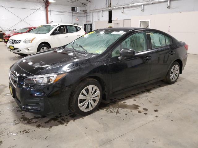 SUBARU IMPREZA 2017 with VIN 4S3GKAA63H3617033 - Photo from auction