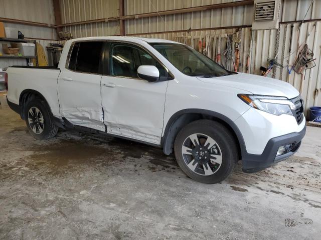 Photo 4 from auction – 2020 HONDA RIDGELINE with VIN 5FPYK3F53LB027353