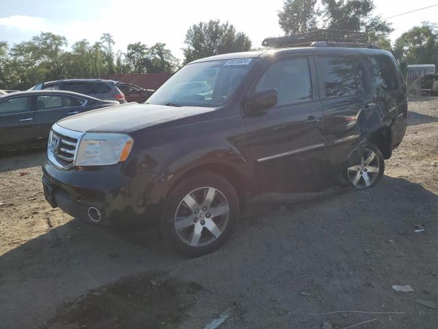 HONDA PILOT TOUR 2014 with VIN 5FNYF4H98EB009095 - Photo from auction
