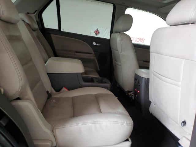 Photo 11 from auction – 2009 FORD TAURUS X L with VIN 1FMDK06W99GA02255