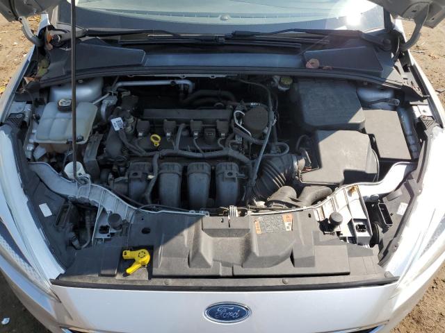 Photo 11 from auction – 2015 FORD FOCUS S with VIN 1FADP3E24FL297618