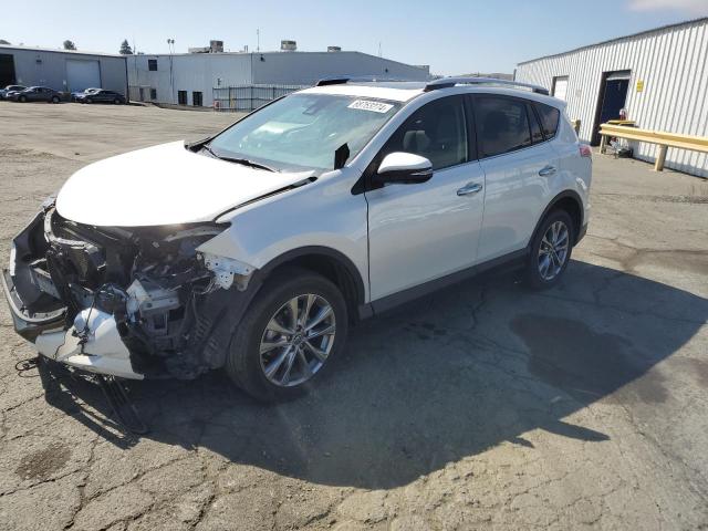 TOYOTA RAV4 LIMIT 2016 with VIN JTMDFREV9GJ054992 - Photo from auction
