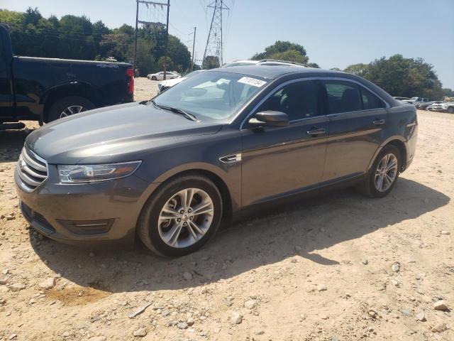 FORD TAURUS SEL 2017 with VIN 1FAHP2E86HG127384 - Photo from auction