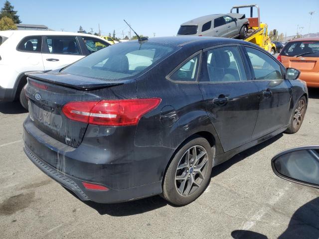 Photo 3 from auction – 2016 FORD FOCUS SE with VIN 1FADP3F23GL396074