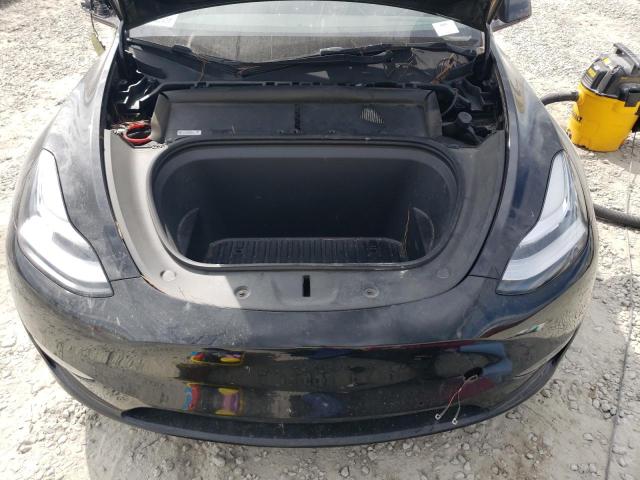 Photo 11 from auction – 2021 TESLA MODEL Y with VIN 5YJYGAEE7MF260881