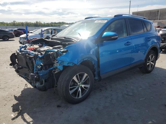 TOYOTA RAV4 XLE 2016 with VIN JTMRFREV7GD182572 - Photo from auction