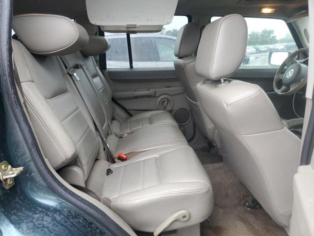 Photo 11 from auction – 2006 JEEP COMMANDER with VIN 1J8HH48NX6C125803