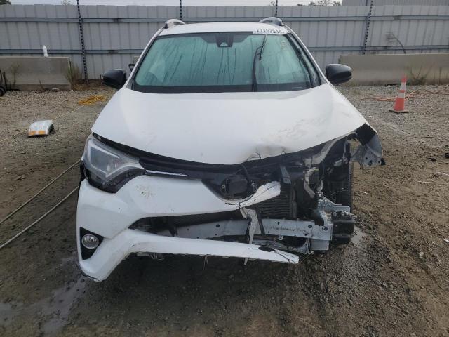 Photo 5 from auction – 2018 TOYOTA RAV4 LE with VIN JTMBFREV5JJ253276