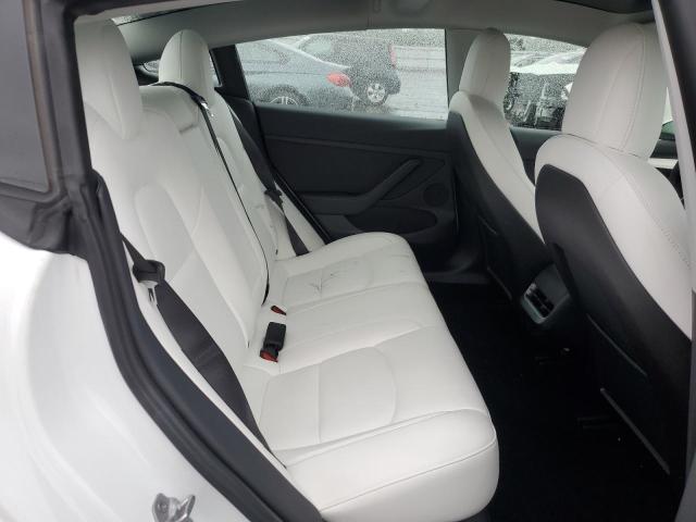 Photo 10 from auction – 2021 TESLA MODEL 3 with VIN 5YJ3E1EA1MF987723