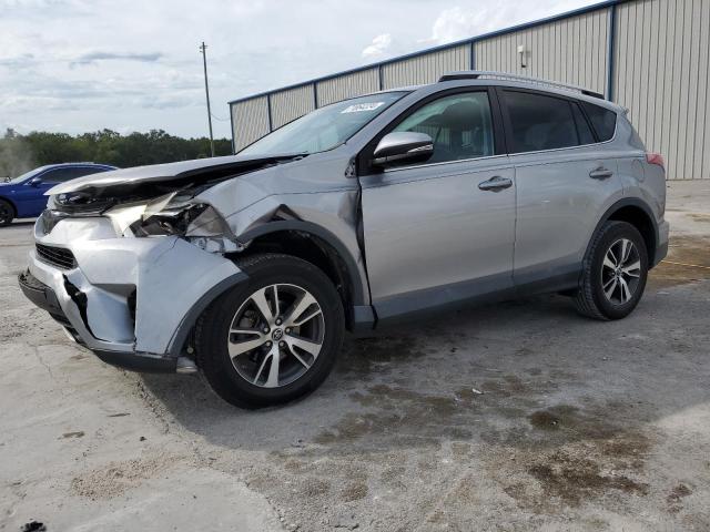 TOYOTA RAV4 XLE 2016 with VIN 2T3WFREV2GW306883 - Photo from auction