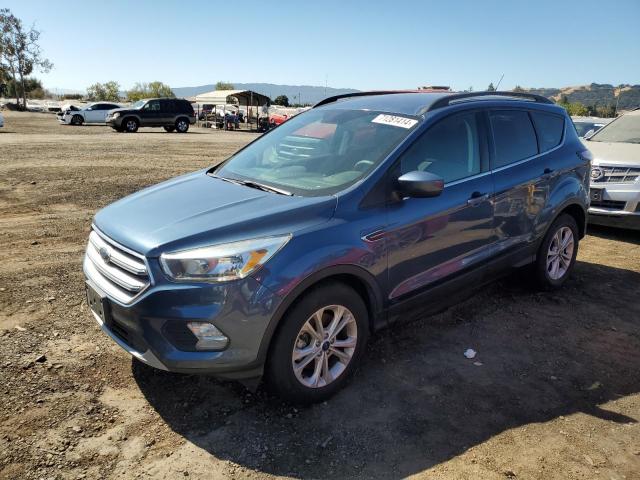 FORD ESCAPE SE 2018 with VIN 1FMCU9GD3JUB29712 - Photo from auction