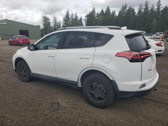 Photo 2 from auction – 2018 TOYOTA RAV4 LE with VIN 2T3BFREV1JW727967