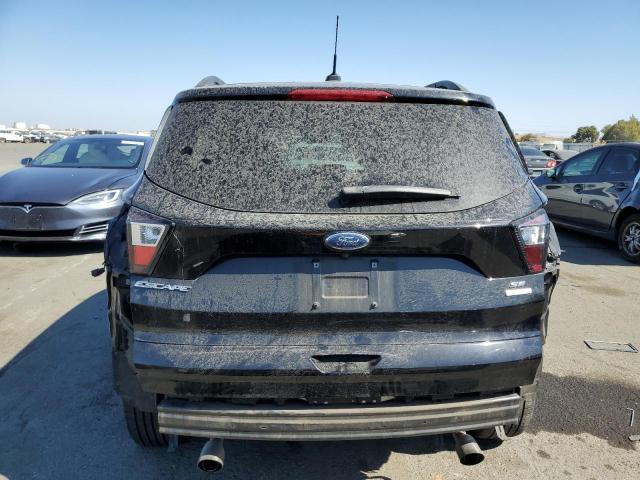 Photo 6 from auction – 2018 FORD ESCAPE SE with VIN 1FMCU0GD6JUA31267