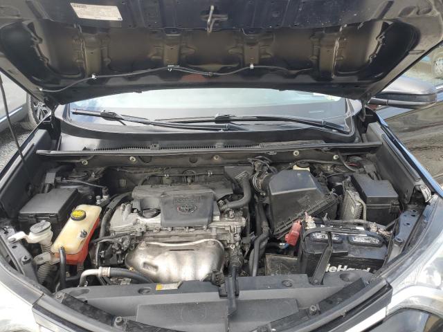 Photo 12 from auction – 2018 TOYOTA RAV4 LE with VIN 2T3ZFREV7JW469050