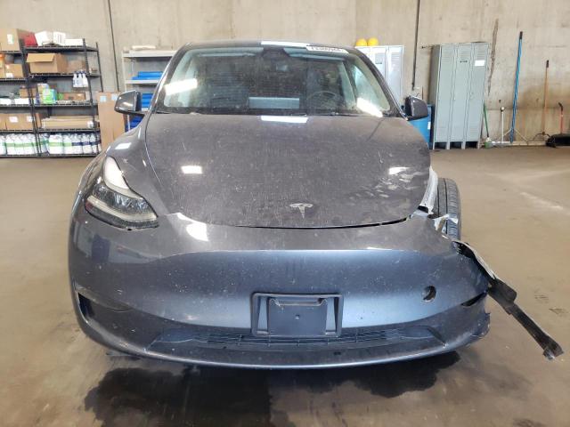Photo 5 from auction – 2023 TESLA MODEL Y with VIN 7SAYGAEE6PF950113