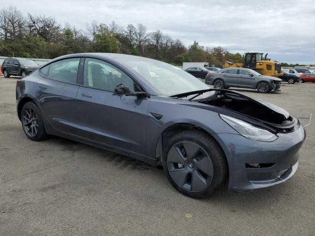 Photo 4 from auction – 2023 TESLA MODEL 3 with VIN 5YJ3E1EA7PF668136