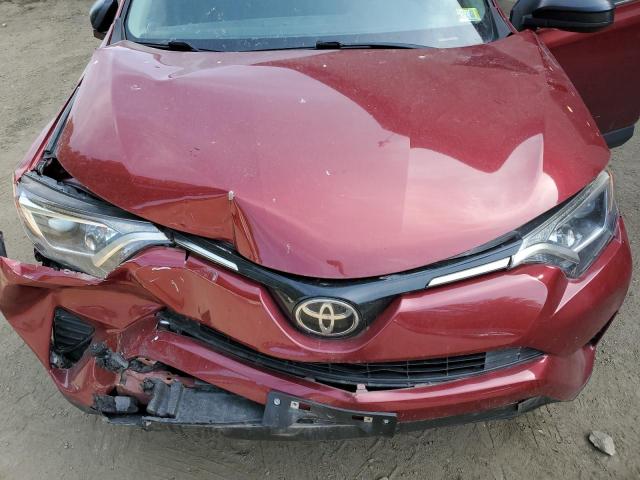 Photo 12 from auction – 2018 TOYOTA RAV4 LE with VIN 2T3BFREV7JW825384