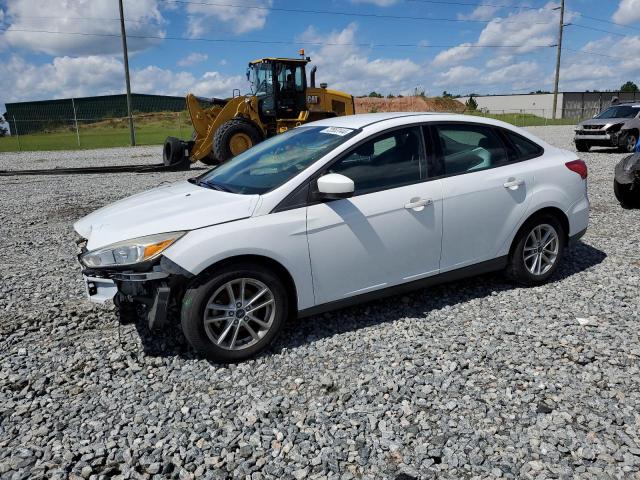 FORD FOCUS SE 2018 with VIN 1FADP3F28JL219902 - Photo from auction