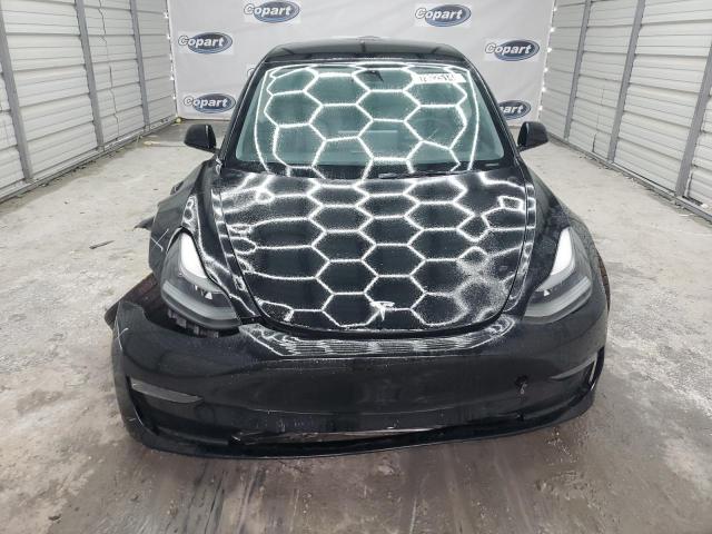 Снимка 5 от търг – 2022 TESLA MODEL 3 с VIN 5YJ3E1EA4NF188262