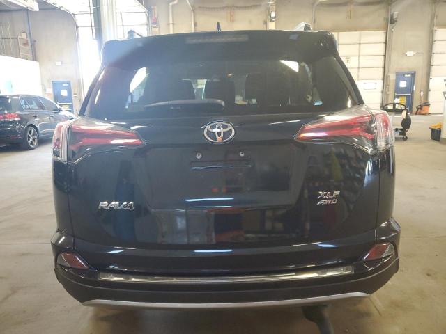Photo 6 from auction – 2017 TOYOTA RAV4 XLE with VIN JTMRFREV8HD219145