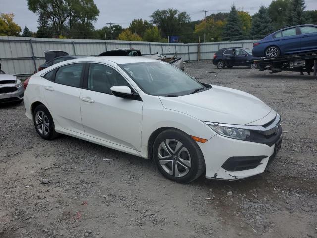 Photo 4 from auction – 2017 HONDA CIVIC LX with VIN 2HGFC2F50HH512205