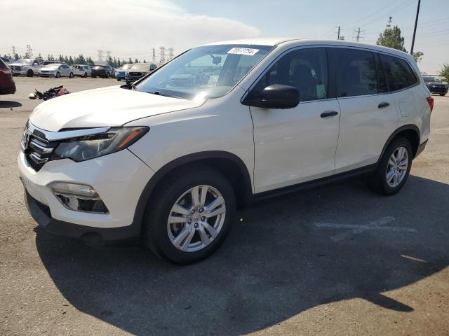 HONDA PILOT LX 2018 with VIN 5FNYF5H18JB018194 - Photo from auction