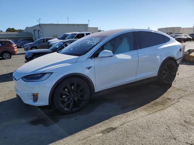 TESLA MODEL X 2018 with VIN 5YJXCBE25JF131407 - Photo from auction