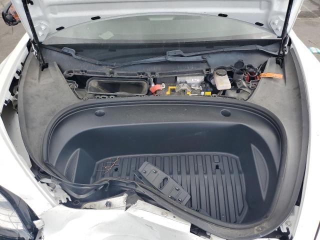 Photo 11 from auction – 2020 TESLA MODEL 3 with VIN 5YJ3E1EA1LF799458
