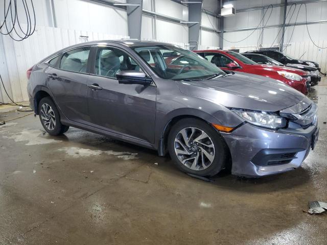 Photo 4 from auction – 2018 HONDA CIVIC EX with VIN 19XFC2F78JE022368