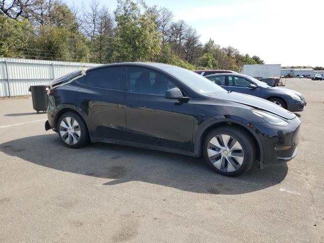 Photo 4 from auction – 2023 TESLA MODEL Y with VIN 7SAYGAEE1PF909386