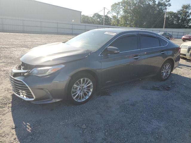 TOYOTA AVALON HYB 2016 with VIN 4T1BD1EB0GU056919 - Photo from auction